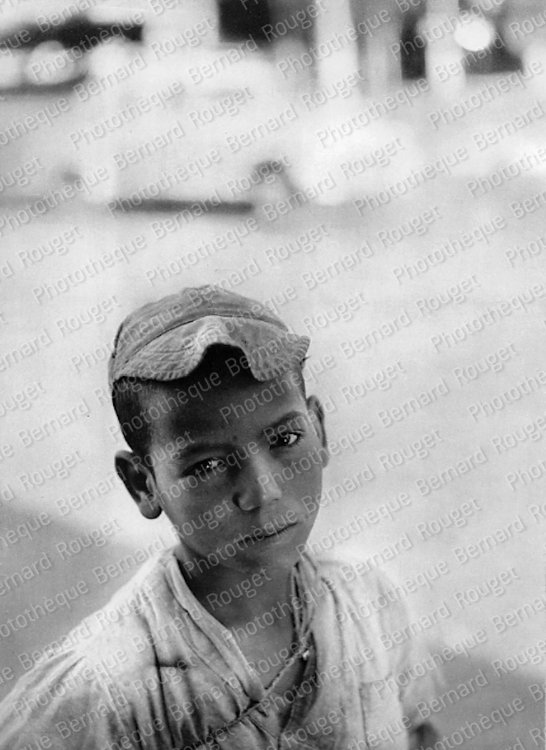 Jeune cireur de soulier, 1950.